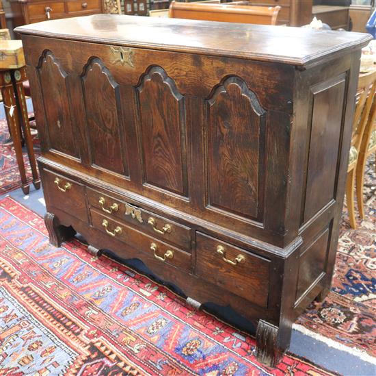A mid 18th century oak mule chest W.139cm